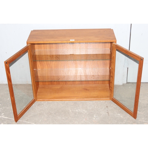 117 - 1960’s Danish style solid teak 2-door wall mounted /table top display cabinet with 2 adjustable and ... 