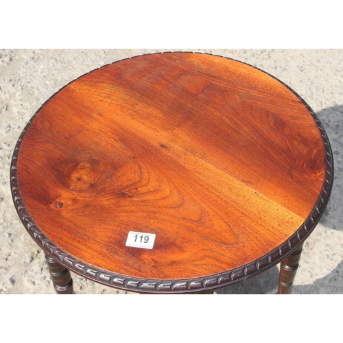 119 - A vintage circular topped side table with carved rope twist border, approx 51cm wide x 51cm deep x 6... 