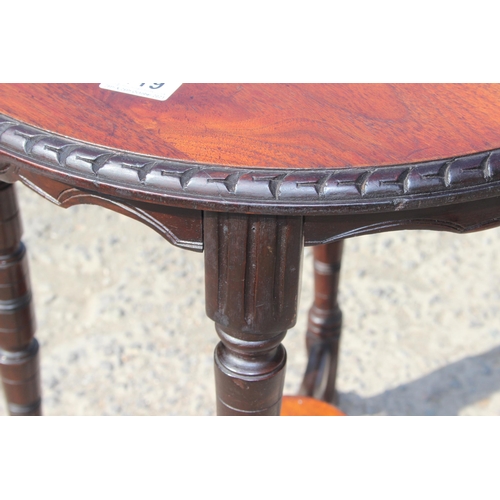 119 - A vintage circular topped side table with carved rope twist border, approx 51cm wide x 51cm deep x 6... 