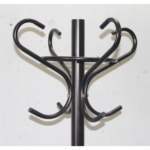 129 - Free standing bentwood style coat/hat stand in black, approx 185cm tall