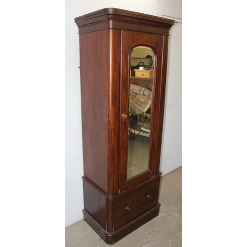 138 - An antique mahogany wardrobe by W. Obitts, with mirrored door and of unusual slim form, approx 76cm ... 