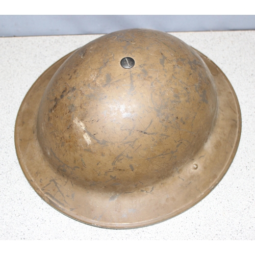 1405 - A WW2 period British military Brodie helmet, dated 1939 and numbered 543054 and a qty of assorted Wa... 