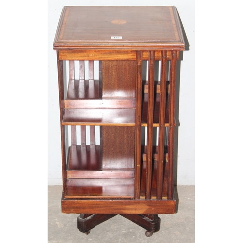 141 - An Edwardian Sheraton Revival mahogany revolving bookcase, approx 46cm wide x 46cm deep x 87cm tall