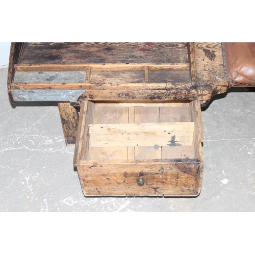 143 - A very unusual rustic pine cobbler's table and stool, approx 110cm wide x 52cm deep x 51cm tall