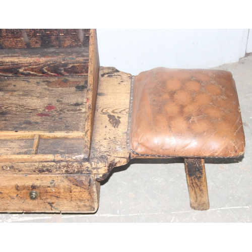 143 - A very unusual rustic pine cobbler's table and stool, approx 110cm wide x 52cm deep x 51cm tall