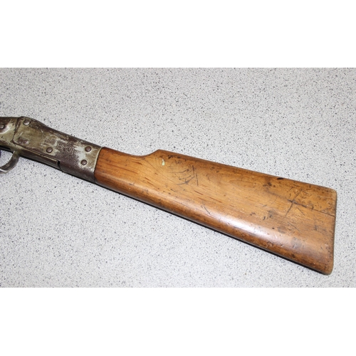 1564 - A Milbro Scout air rifle with a break barrel and wooden stock, approx 81cm long