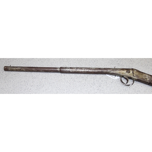 1564 - A Milbro Scout air rifle with a break barrel and wooden stock, approx 81cm long