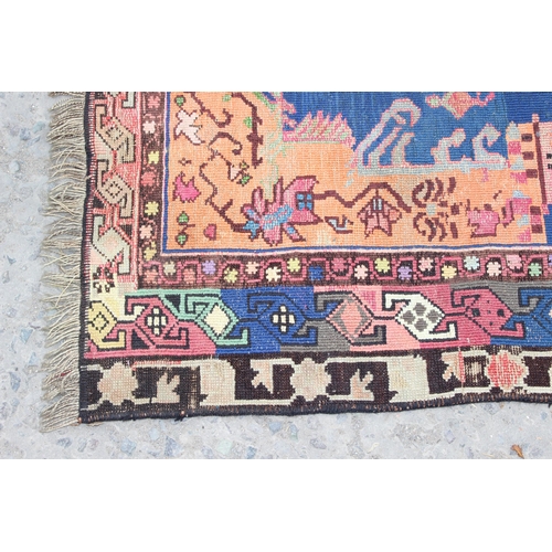 212 - A vintage Baluch style prayer rug of red and blue ground, approx 150cm x 85cm