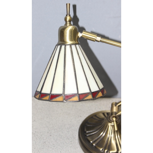 258 - An adjustable brass desk lamp with Tiffany style shade, approx 50cm when extended