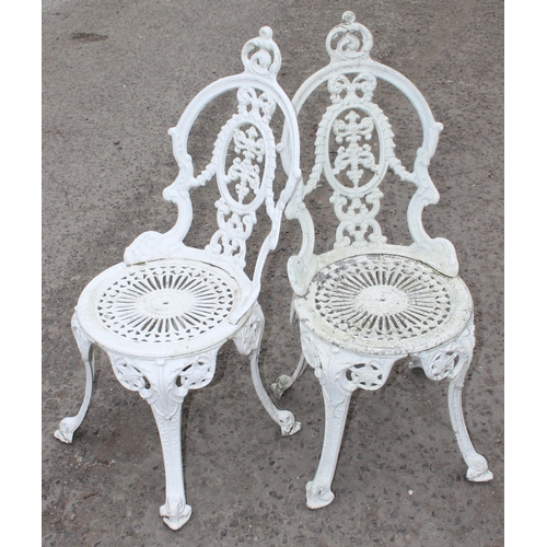 310 - 2 round antique style white painted garden tables, 2 chairs and 2 stools of similar design, largest ... 