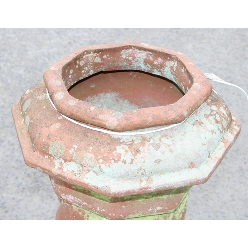 317 - Large antique terracotta chimney pot of twist decoration, approx 101cm tall