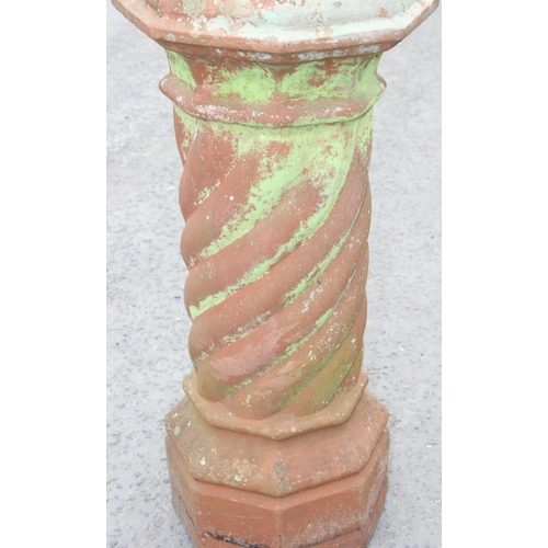 317 - Large antique terracotta chimney pot of twist decoration, approx 101cm tall