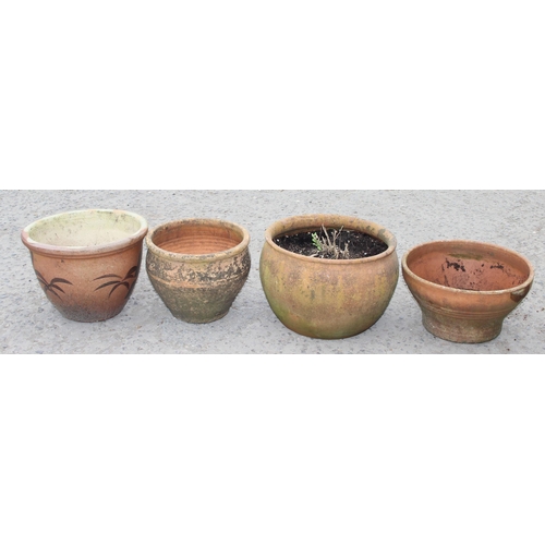 322 - 4 garden terracotta pots, largest approx 28cm H x 40cm W