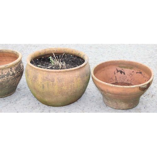 322 - 4 garden terracotta pots, largest approx 28cm H x 40cm W