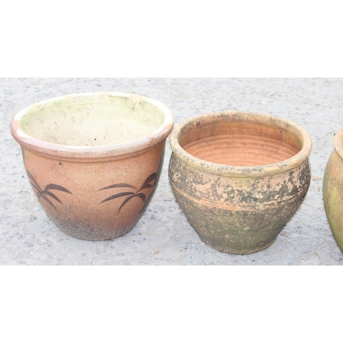 322 - 4 garden terracotta pots, largest approx 28cm H x 40cm W