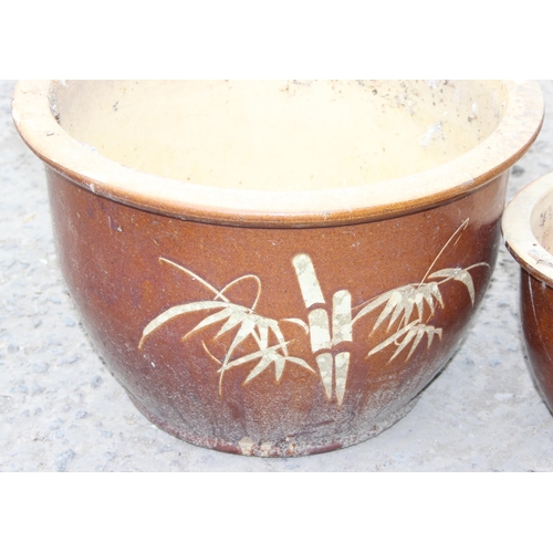 335 - 3 graduated brown glazed pots with bamboo decoration, largest approx 48cm W x 31cm H