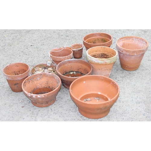 345 - Selection of terracotta garden pots, largest approx 26cm tall