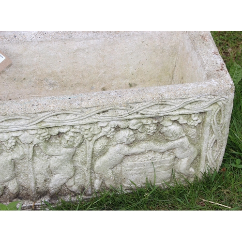 349 - A cast concrete garden planter with cherub design, approx 76cm W x 24cm D x 24cm H, one of 3 similar... 