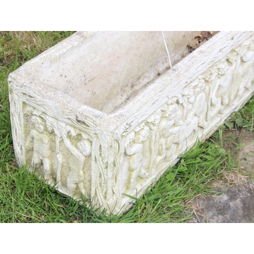 350 - A cast concrete garden planter with cherub design, approx 76cm W x 24cm D x 24cm H, one of 3 similar... 