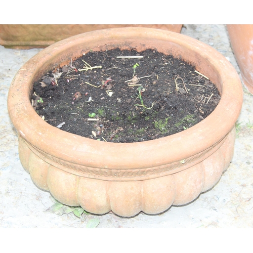 357 - 4 terracotta vintage pots 1 containing box hedging, largest approx 45cm H x 40cm W