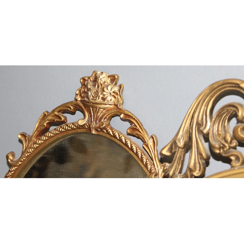 473 - 3 gilt framed oval mirrors with rococo or neo classical designs, largest approx 79cm x 41cm