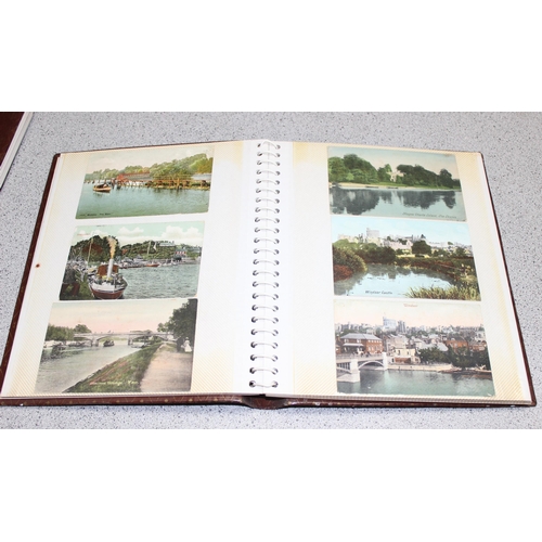 529 - 2 albums of antique postcards, some of local interest, and a framed print of an engraving by T. Hear... 