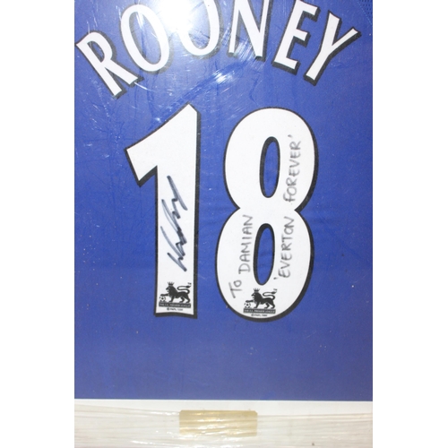 709 - Signed Wayne Rooney Everton No. 18 football shirt in frame, signed 'To Damian'