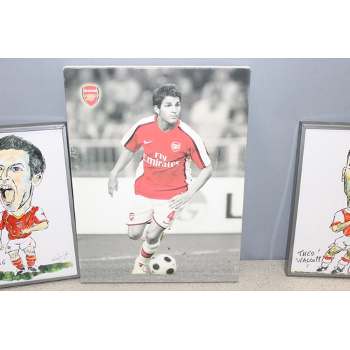 710 - Assorted memorabilia items for the Arsenal football team, incl caricatures in frames