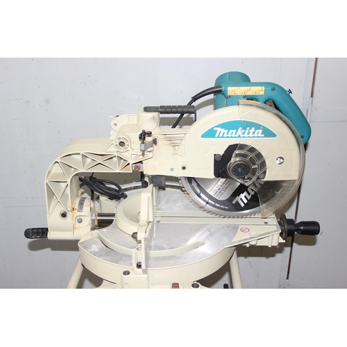 816 - Makita LS1219 electric chop saw with folding stand