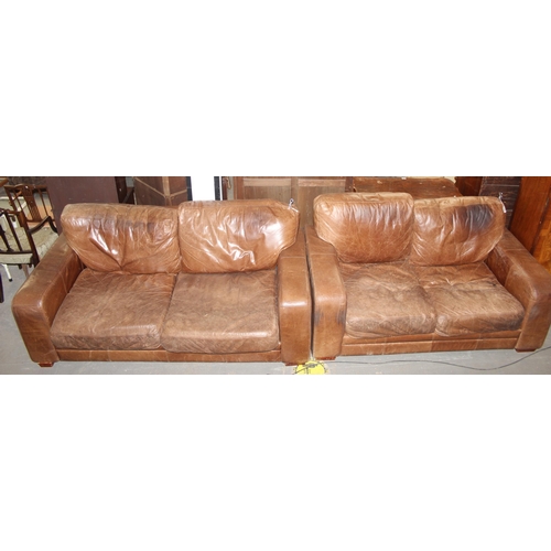 144 - Two modern brown leather sofas, largest measures 200cm x 100cm x 80cm