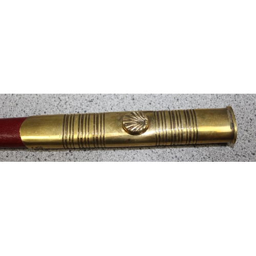 1424 - A tapering walking cane with hollow centre housing a deconstructed Masonic Sword with engraved decor... 