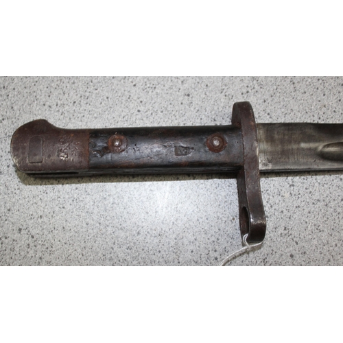 1427 - A c.WW2 period Mauser bayonet with scabbard, indistinctly marked but possibly Austrian, approx 40cm ... 