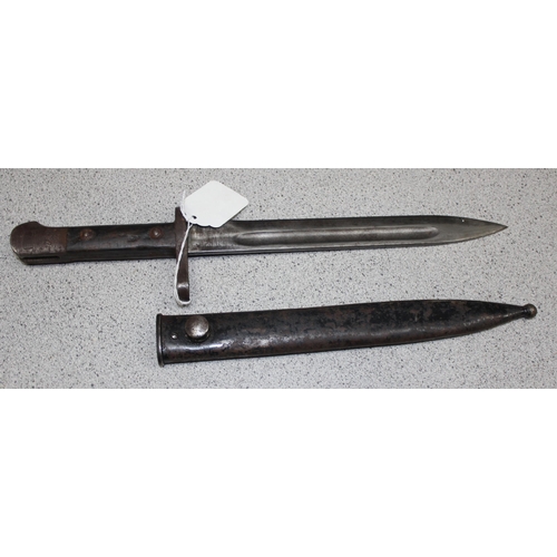 1427 - A c.WW2 period Mauser bayonet with scabbard, indistinctly marked but possibly Austrian, approx 40cm ... 