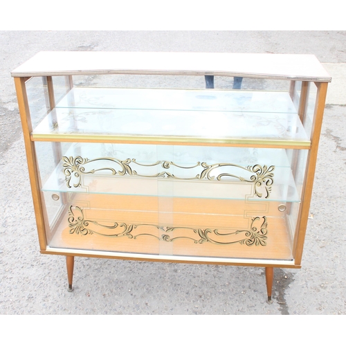 164 - A retro 1950's drinks cabinet with gilt painted details, approx 104cm wide x 29cm deep x 94cm tall