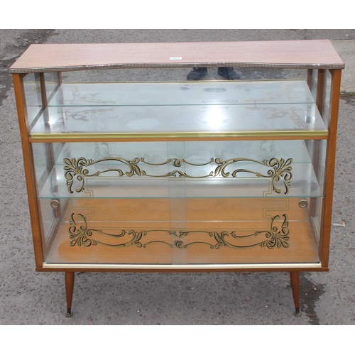 164 - A retro 1950's drinks cabinet with gilt painted details, approx 104cm wide x 29cm deep x 94cm tall