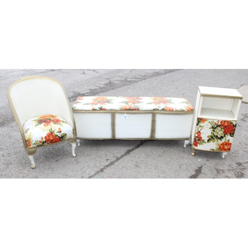 167 - Lloyd Loom style bedroom suite with floral upholstery, to inc a bedroom chair, ottoman and bedside c... 