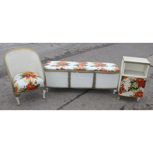 167 - Lloyd Loom style bedroom suite with floral upholstery, to inc a bedroom chair, ottoman and bedside c... 