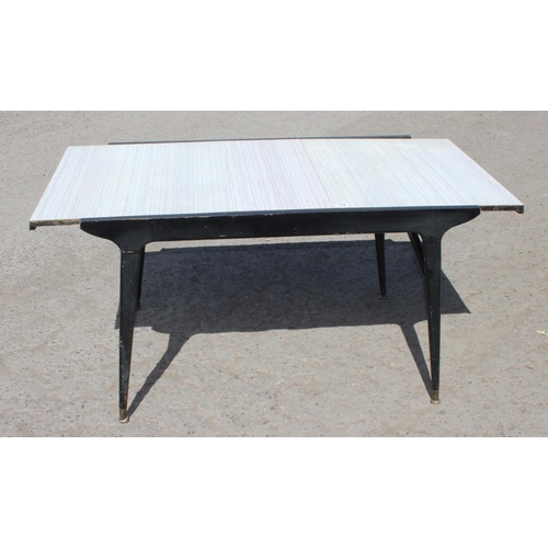 178 - A retro Formica extending dining table by Berry Furniture, approx 122cm wide (152cm extended) x 82cm... 