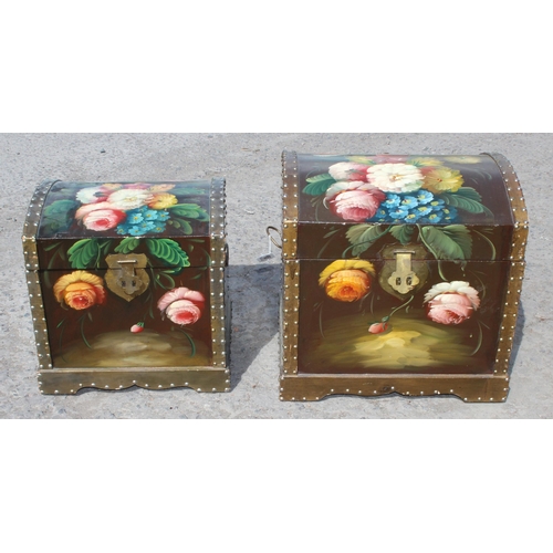 180 - A near pair of stacking hand painted storage trunks with floral motifs, largest approx 51cm wide x 4... 