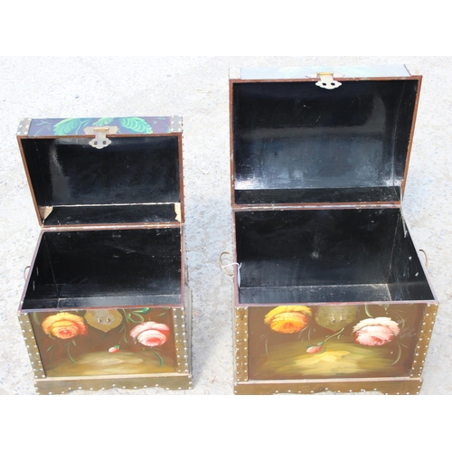 180 - A near pair of stacking hand painted storage trunks with floral motifs, largest approx 51cm wide x 4... 