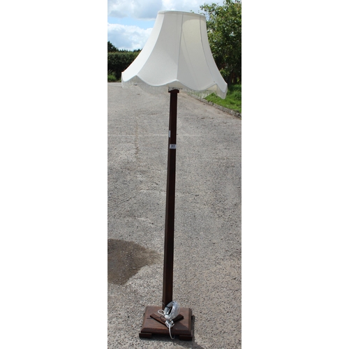 263 - An Art Deco period oak standard lamp with shade, approx 193cm tall