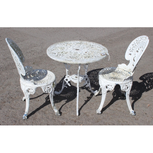 367 - A Victorian style white painted aluminium garden table and 2 chairs, the table approx 67cm wide x 67... 