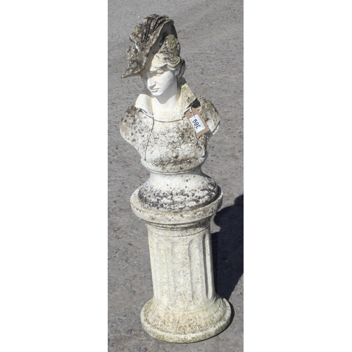 369 - A weathered concrete garden statue of a female bust on column plinth, approx 85cm tall