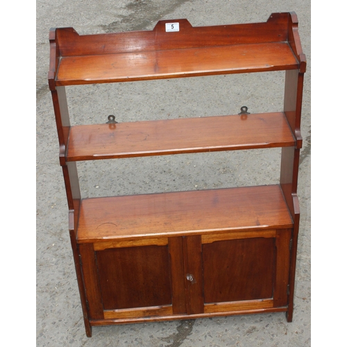 5 - A vintage mahogany bookcase with 2 door cupboard base, approx 69cm wide x 18cm deep x 95cm tall