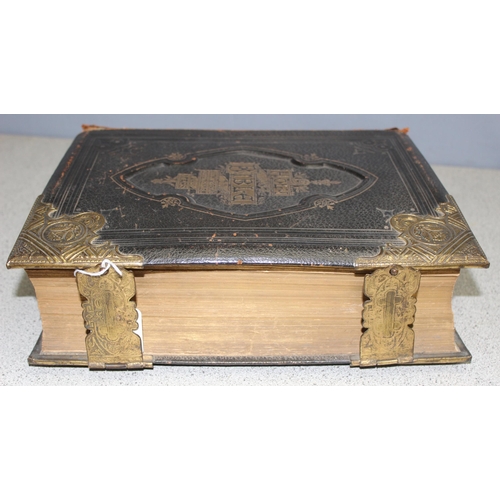 561 - Large antique leather and brass-bound Brown's Self-Interpreting Family Bible, with plate illustratio... 