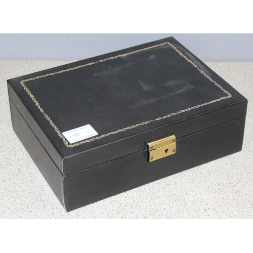 1190W - A vintage jewellery box and contents