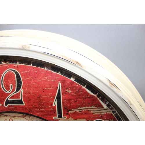 1358 - Large vintage replica wall clock with writing for 'Hotel La Fleur' approx. 62cm wide