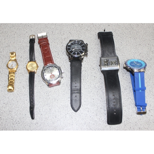 1359 - A large qty of assorted watches, some boxed and a 4 watch display box etc