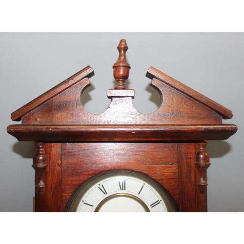 1363 - Antique mahogany cased mechanical wall clock with pendulum and key, approx 75cm