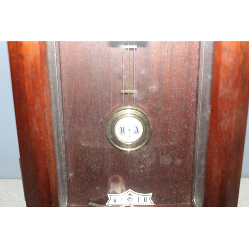 1363 - Antique mahogany cased mechanical wall clock with pendulum and key, approx 75cm